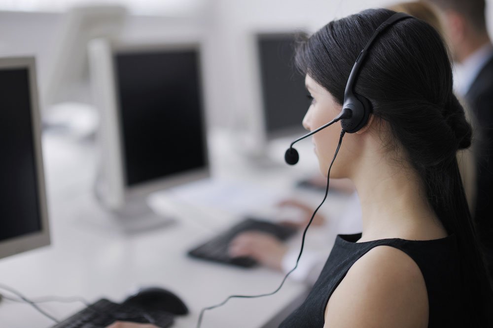 business people group with headphones giving support in  help desk office to customers, manager giving training and education instructions